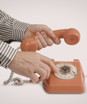 Ouderwetse draaitelefoon, oranje